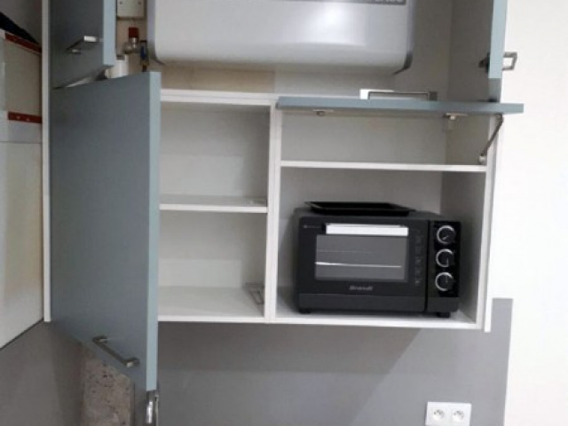 Kitchenette sur mesure Vert Fjord et granit en U  Paris 20e